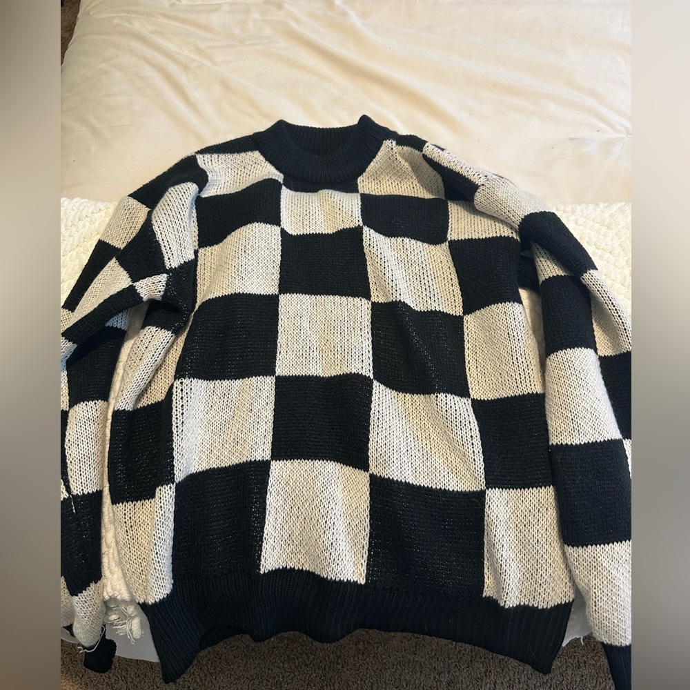 Black and white checkered sweater